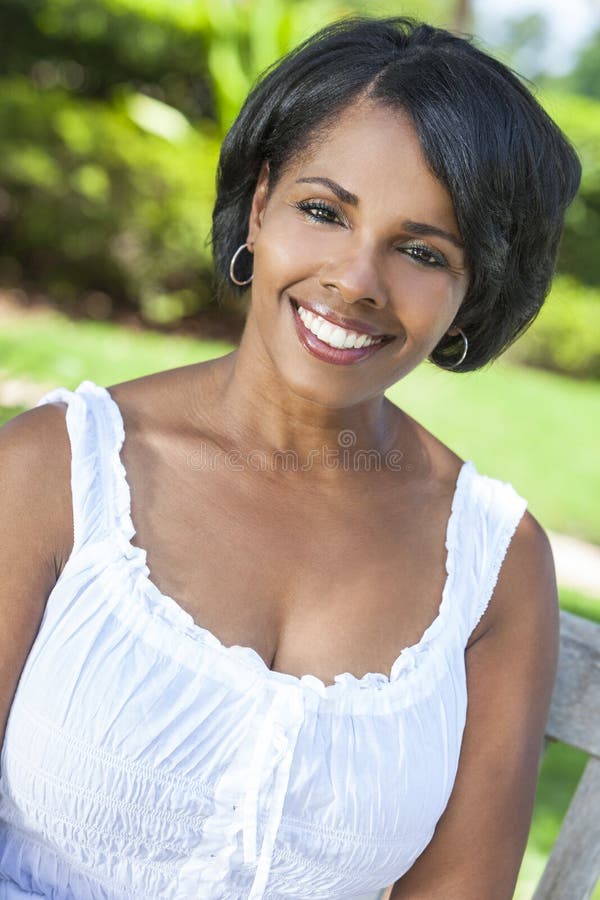 files/beautiful-african-american-woman-relaxing-outside-happy-middle-aged-smiling-46298787.jpg